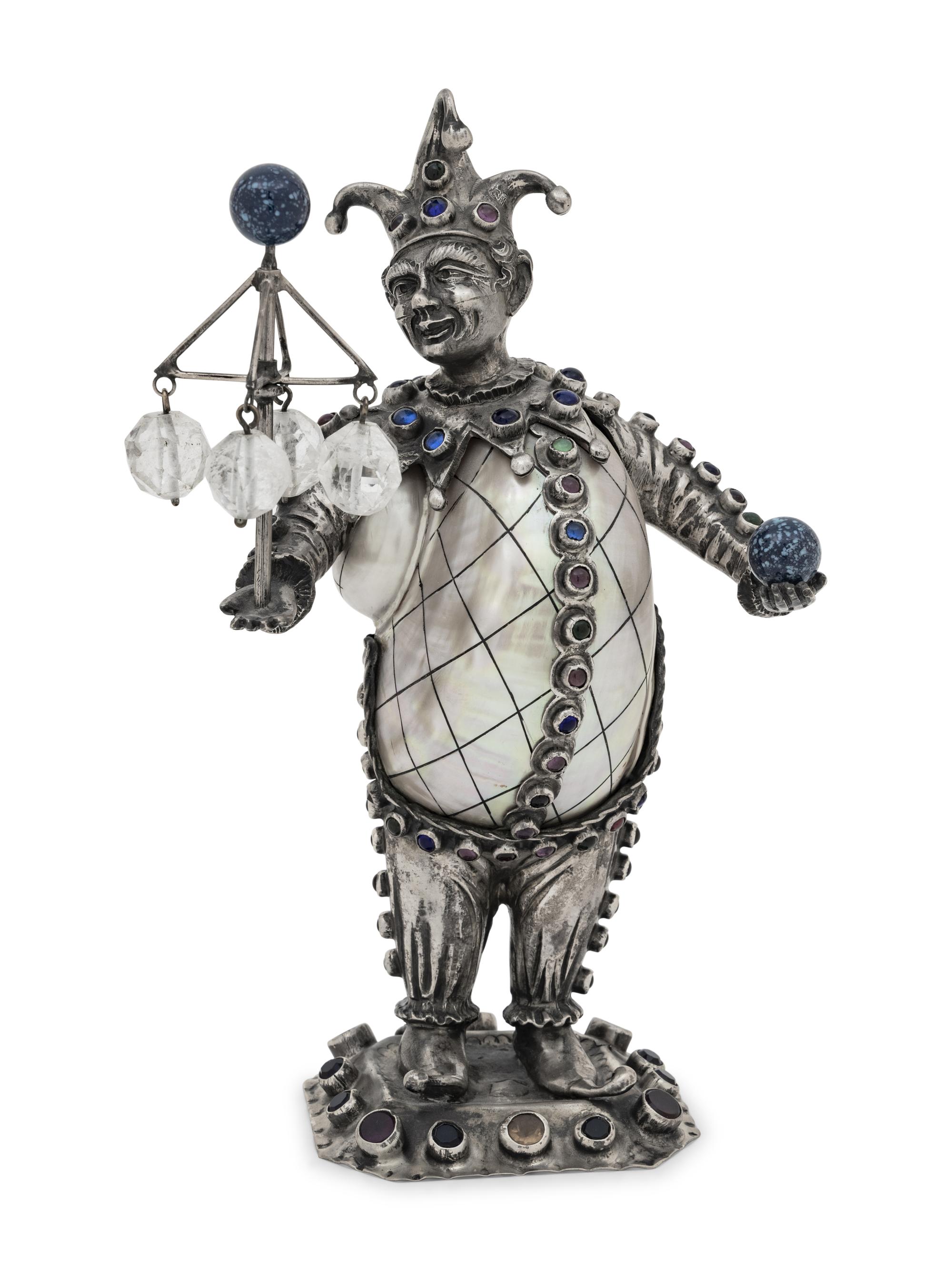 A German Silver and Jewel-Mounted Shell Figure of a Jester