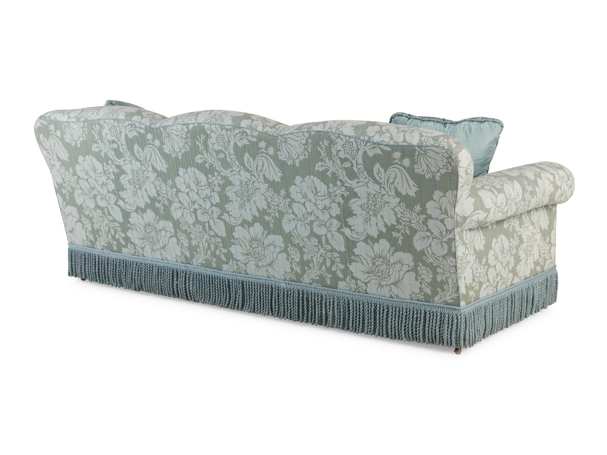 A Damask Upholstered Sofa with Buillon Fringe