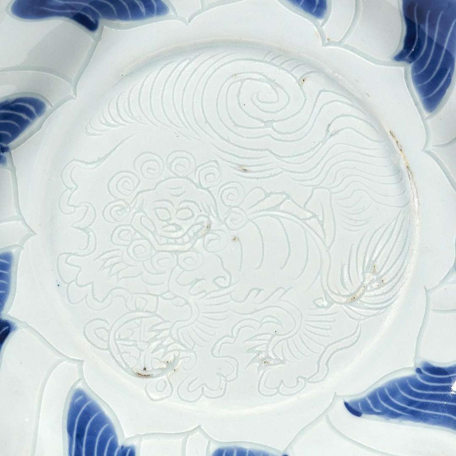 A pair of Chinese blue and white porcelain incised dishes Ming Dynasty