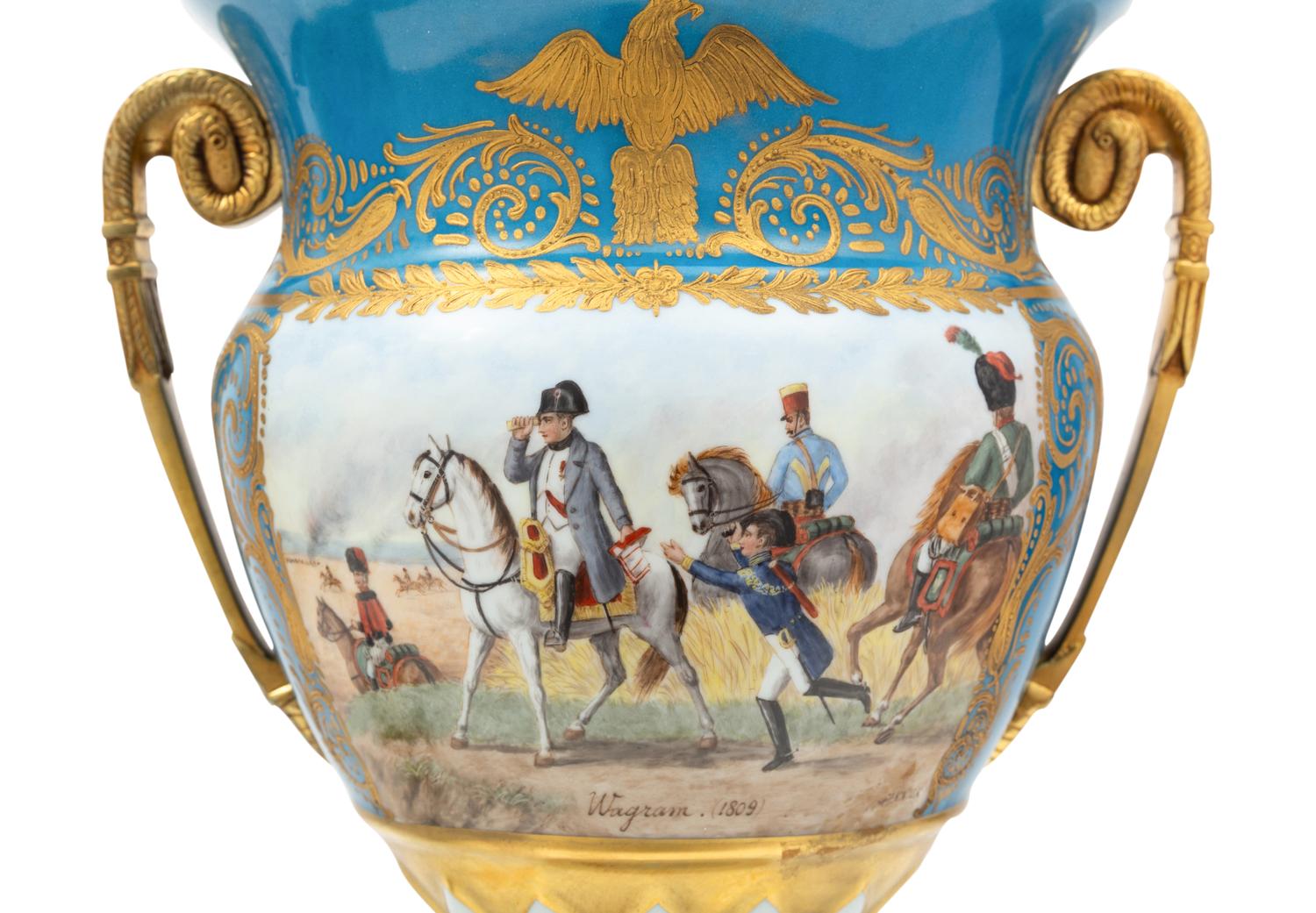 A Pair of Sevres Style Porcelain and Gilt-Bronze Mounted Napoleonic Urns