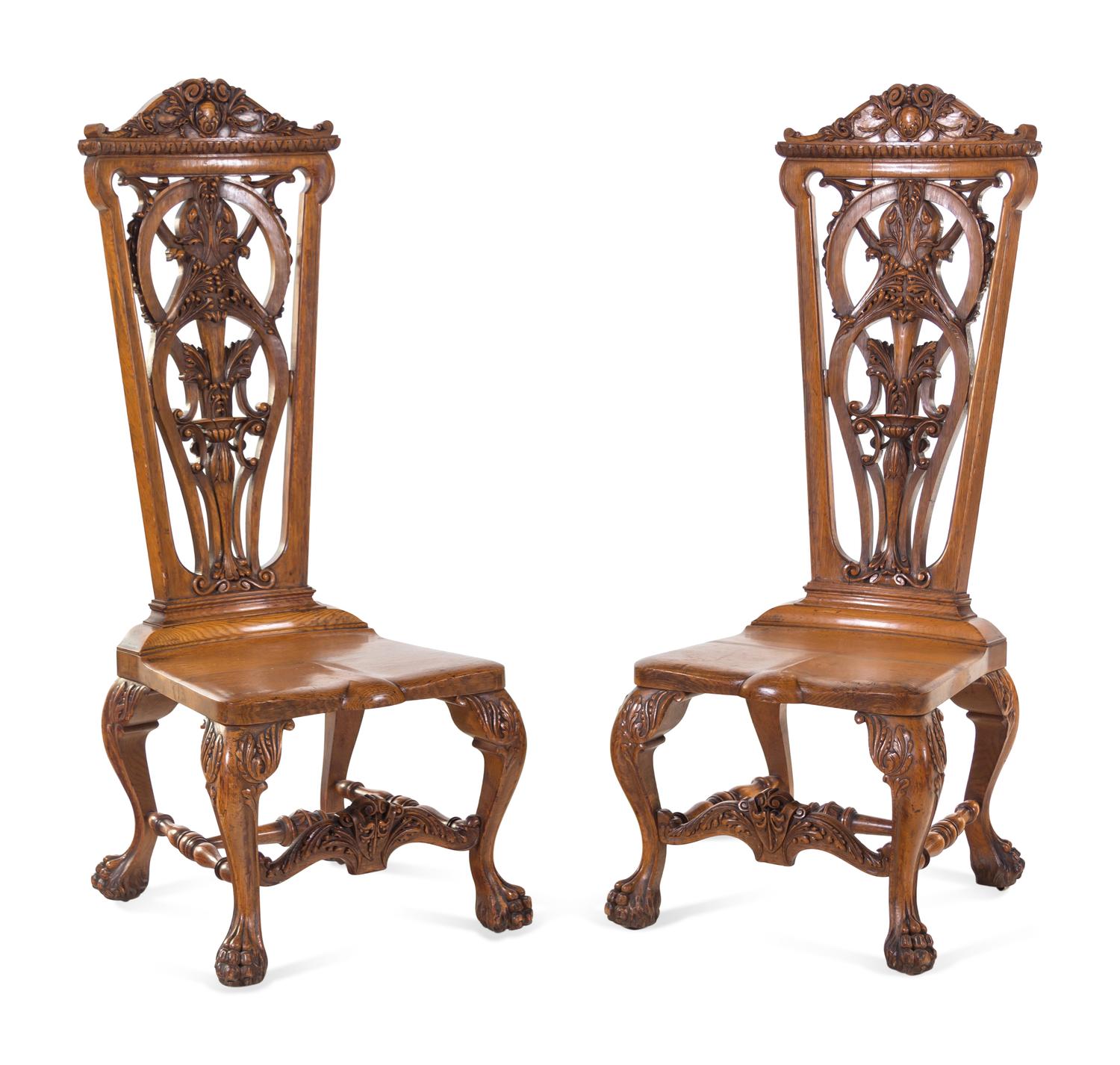 A Pair of Continental Renaissance Revival Carved Oak Side Chairs