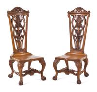 A Pair of Continental Renaissance Revival Carved Oak Side Chairs