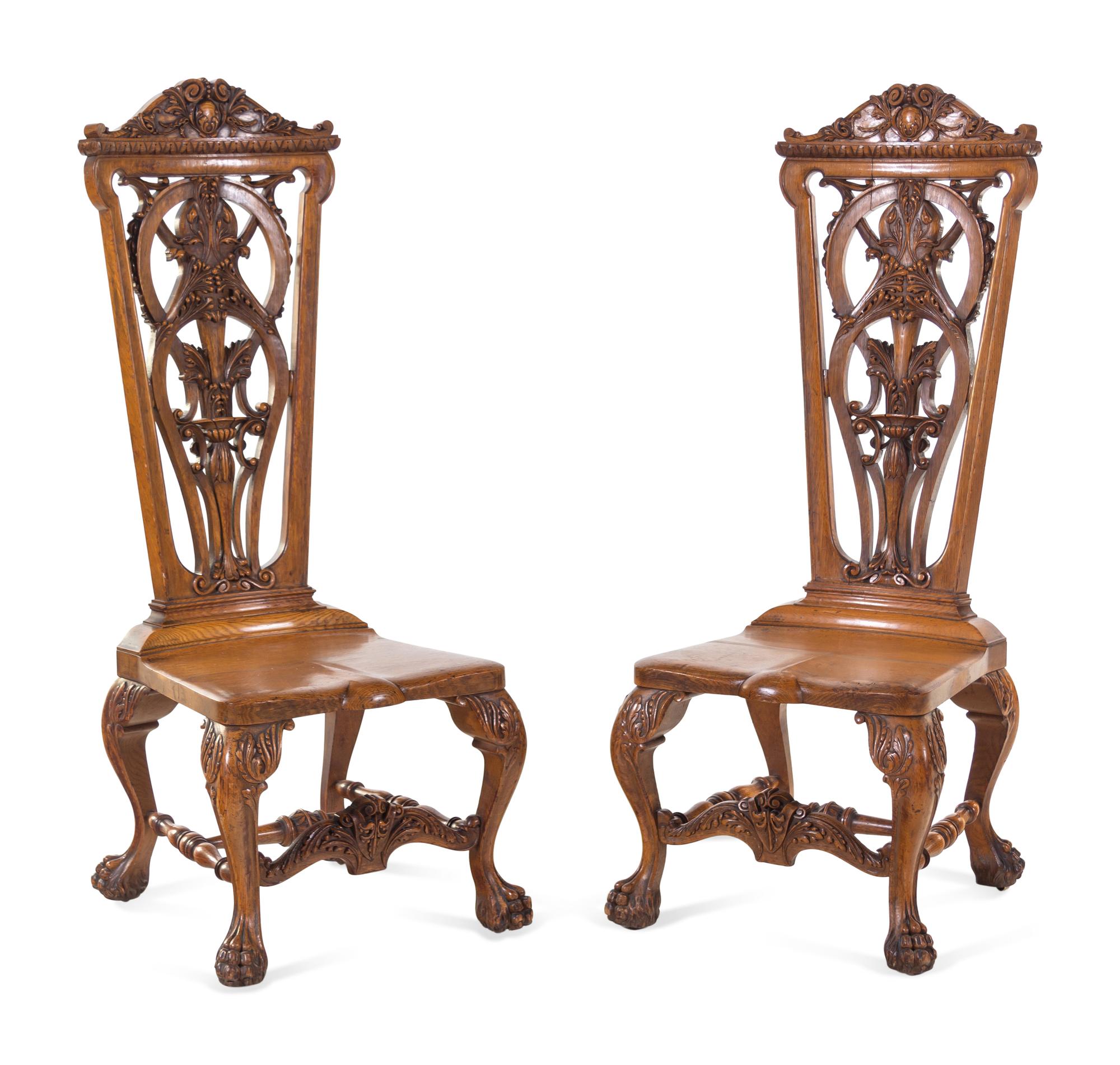 A Pair of Continental Renaissance Revival Carved Oak Side Chairs
