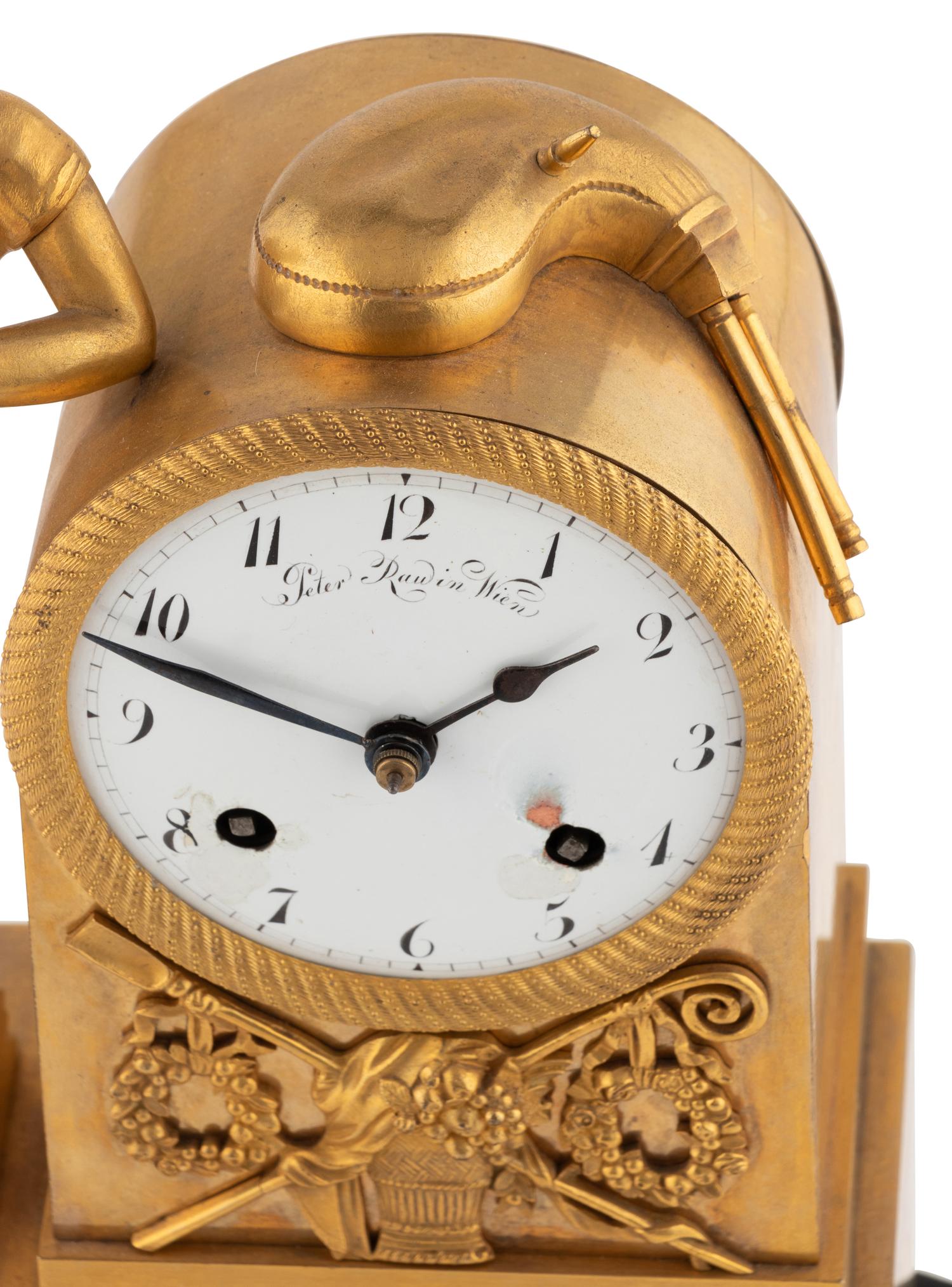 An Empire Gilt Bronze Fusée Musical Clock