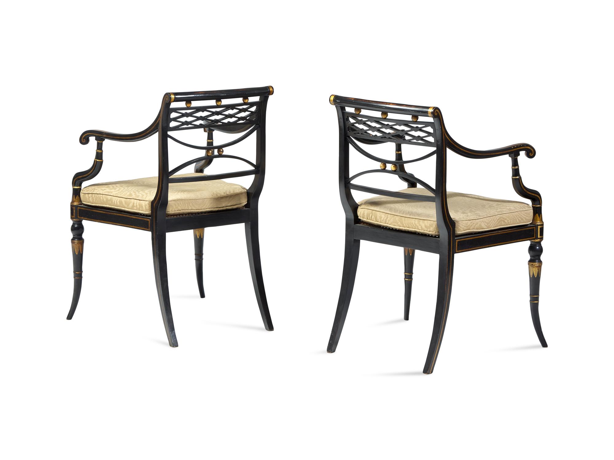 A Pair of Regency Ebonized and Parcel-Gilt Armchairs