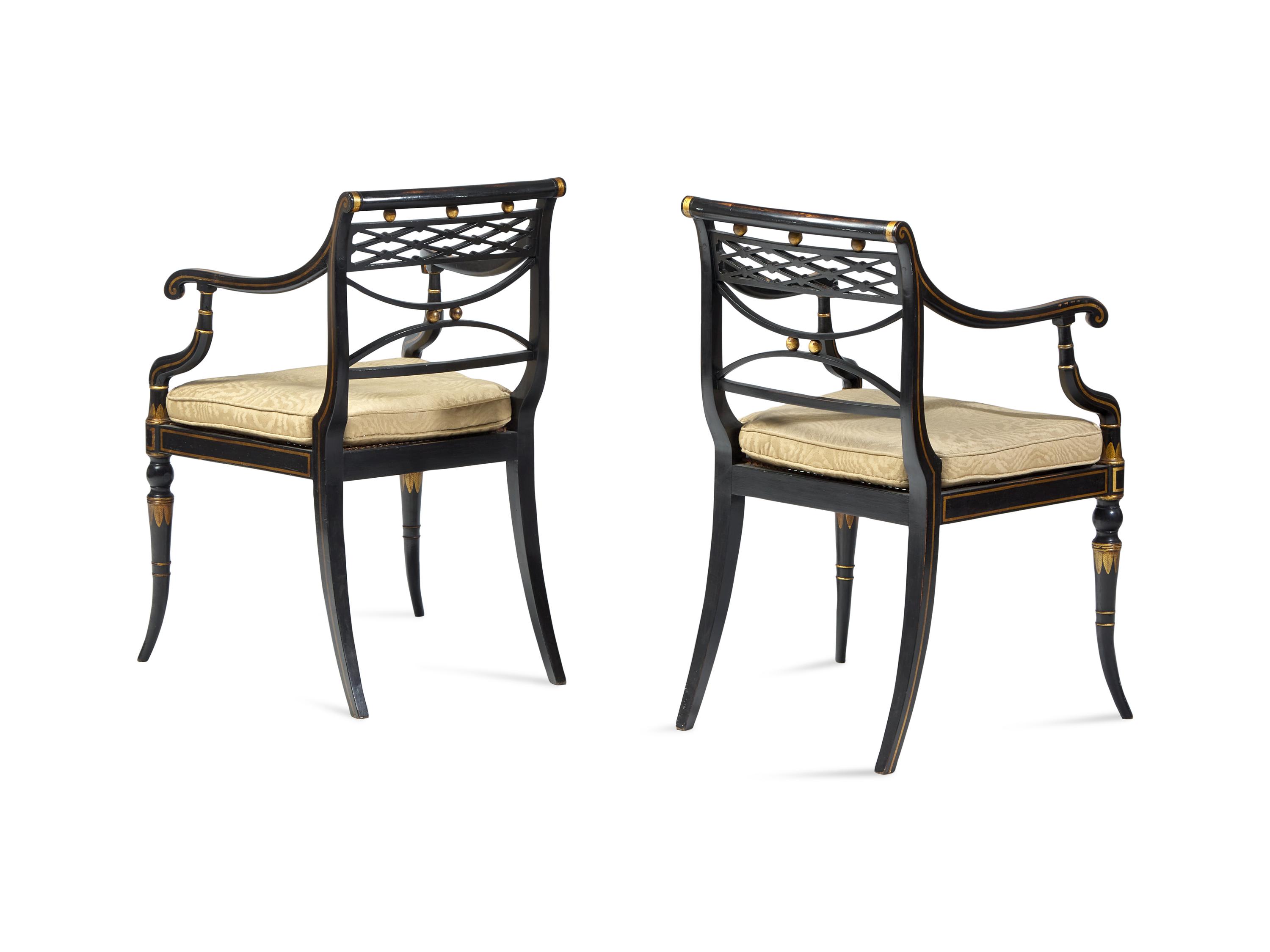 A Pair of Regency Ebonized and Parcel-Gilt Armchairs