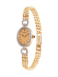 SEIKO, 14K YELLOW GOLD AND DIAMOND WRISTWATCH
