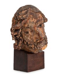 A Continental Carved and Polychromed Bust of a Saint