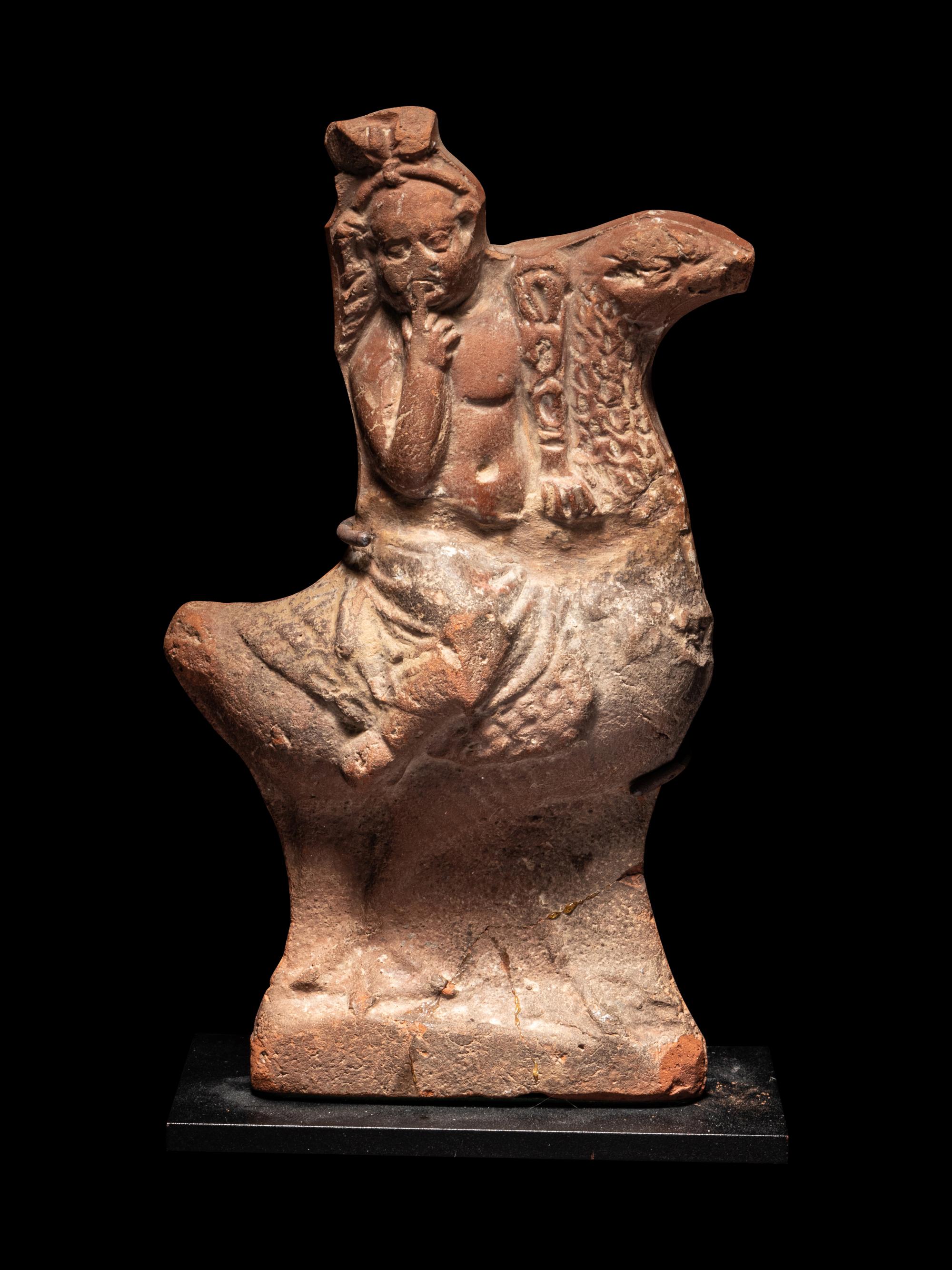 A Roman Terracotta Harpocrates Riding a Goose
