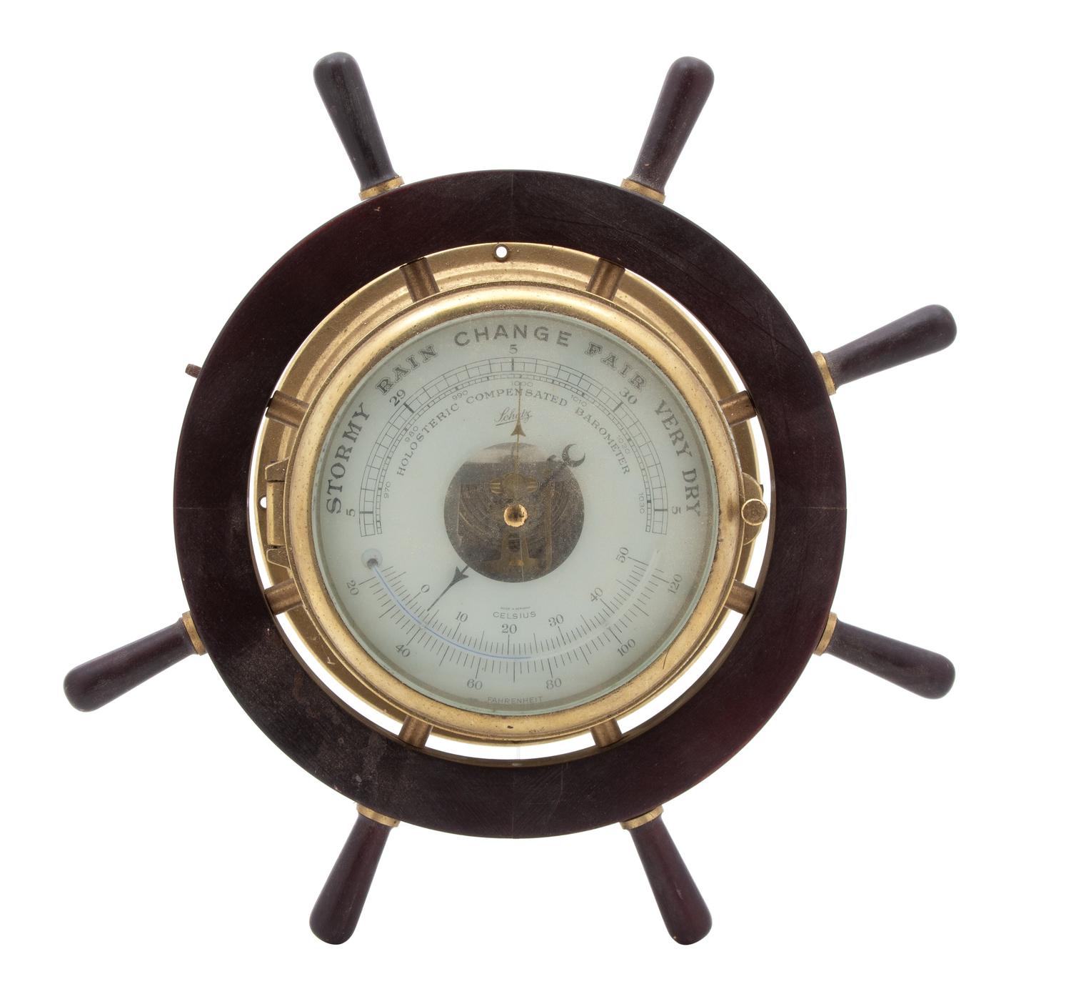 A Brass Cased and Mahogany Ship's Wheel Style Barometer Diameter 13 1/4 inches. — 20TH CENTURY