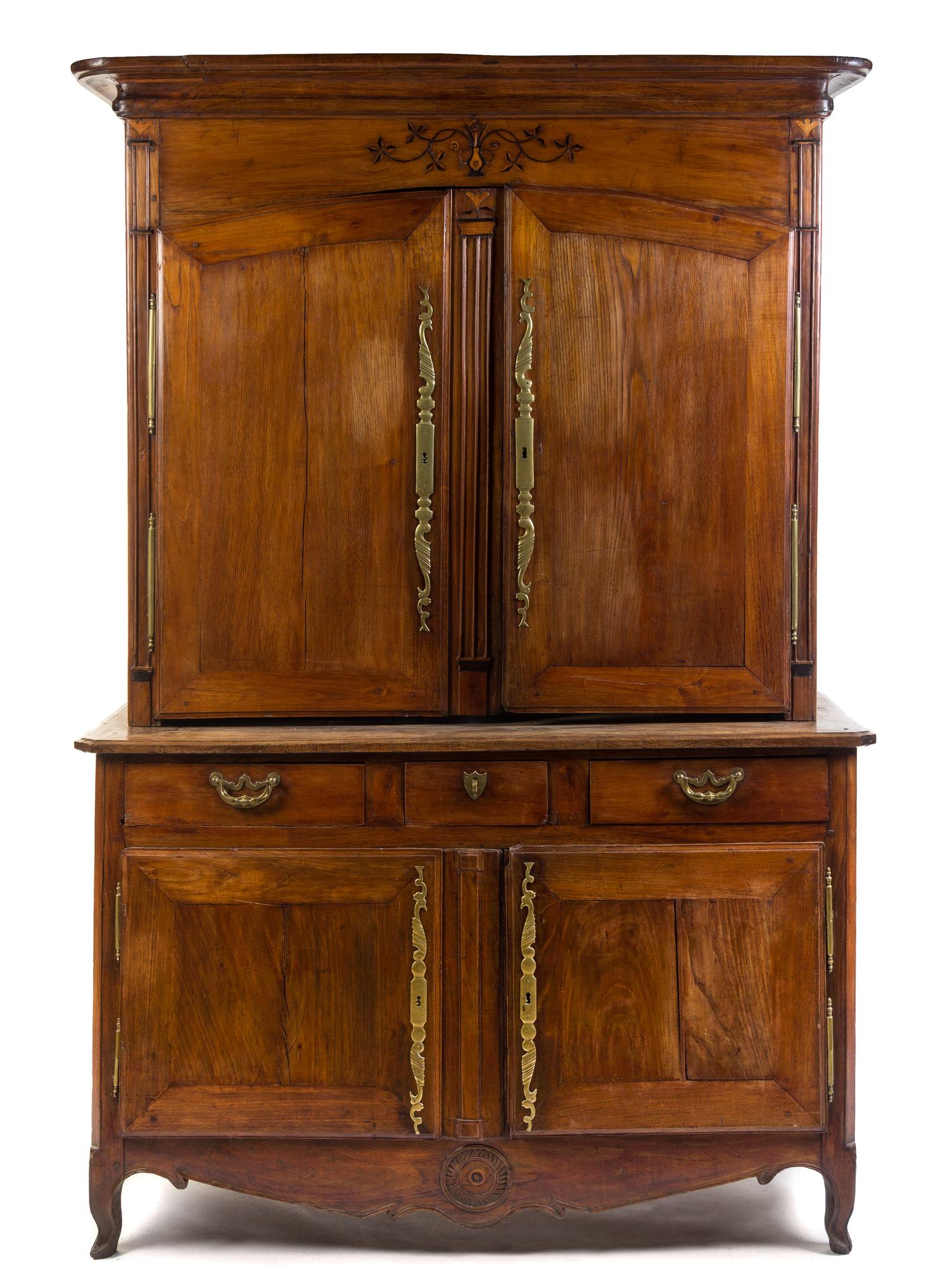 A Louis XV Provincial Walnut Stepback Cupboard Height 92 x width 59 3/4 x depth 26 inches. — 18TH CENTURY