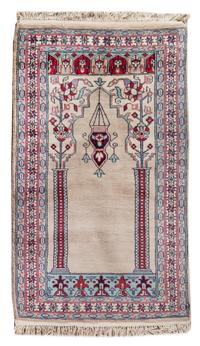 A Persian Wool Prayer Rug 4 feet x 2 feet 7 1/2 inches. — 20TH CENTURY