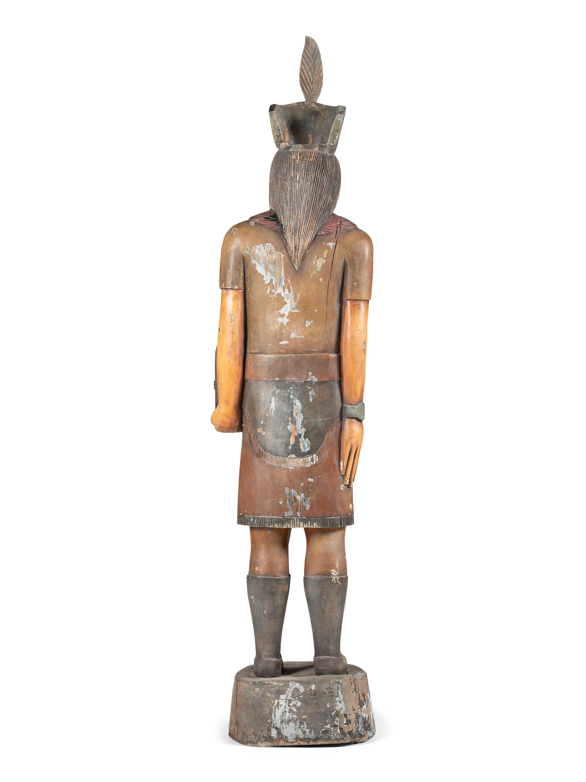 A Carved and Painted Wood Tobacco Trade Figure of a Native American