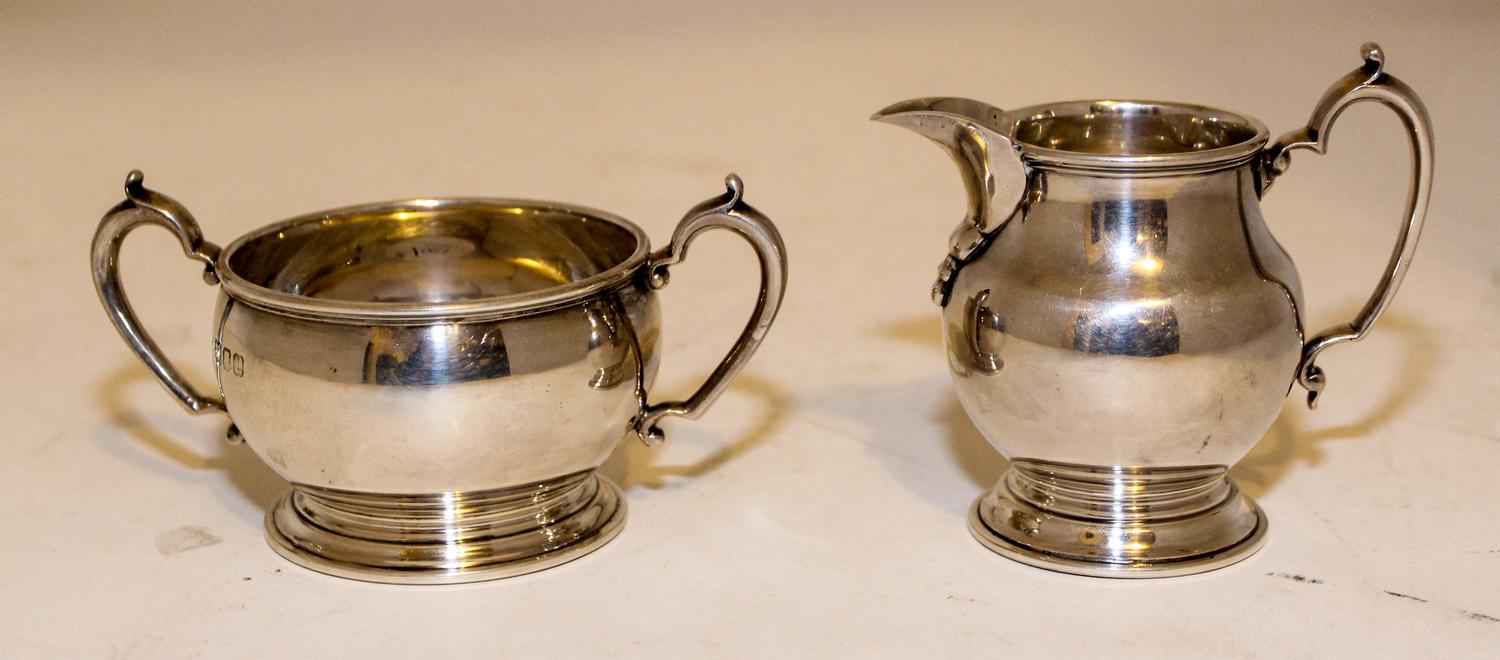 An English Creamer and Sugar Set Height of creamer 3 1/2 inches. — 20TH CENTURY