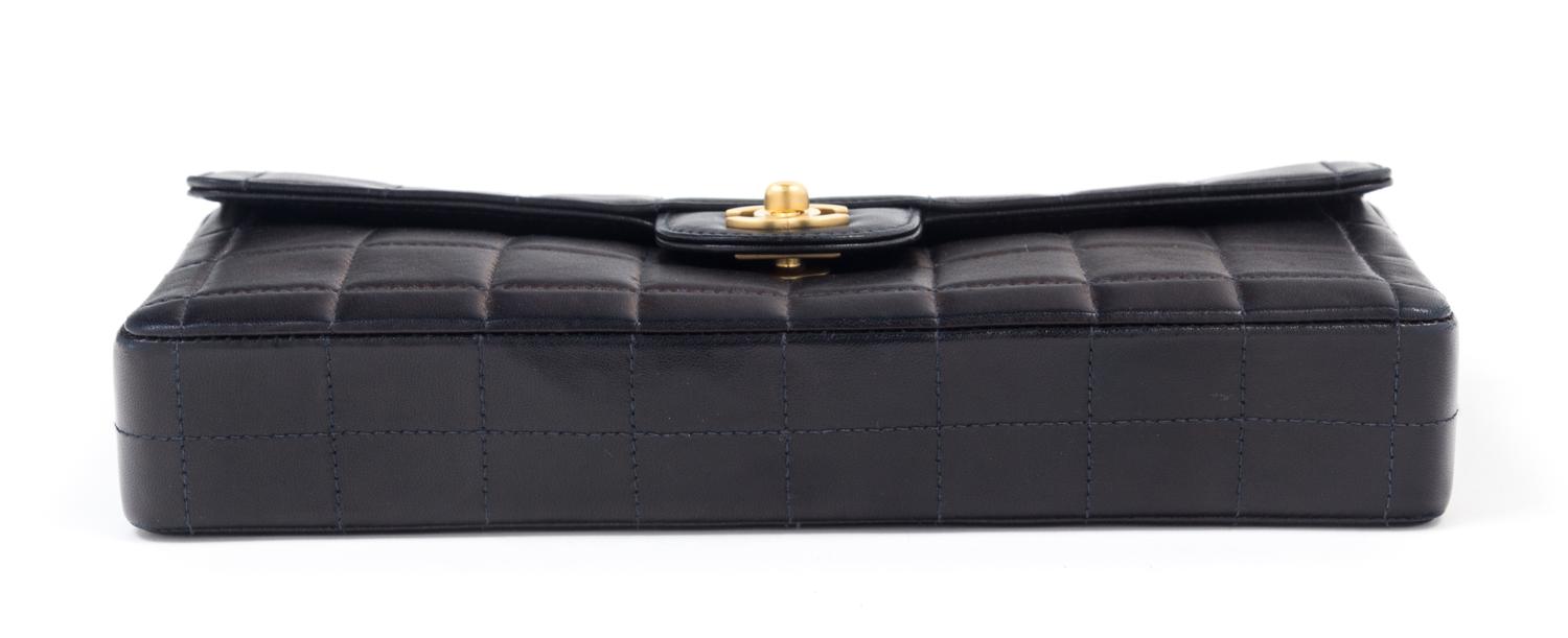 A Chanel Black Lambskin Chocolate Bar Flap Handbag, 10.5" x 5.5" x 1.5"; Strap drop: 12".