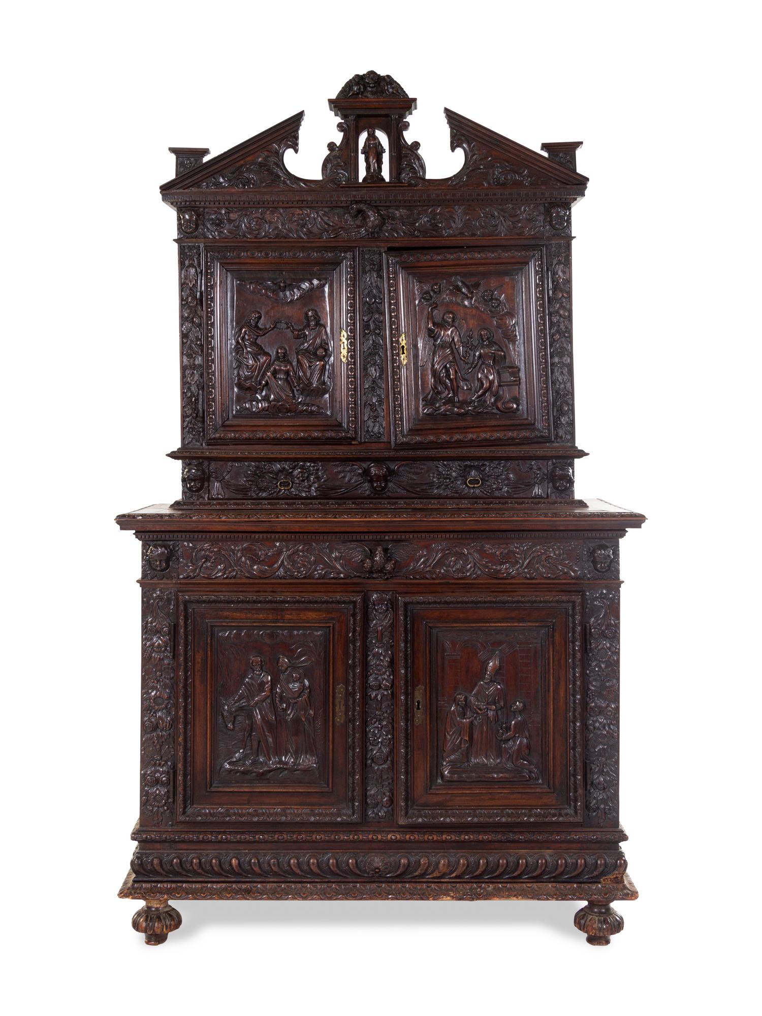 A Henry IV Carved Walnut Cupboard
