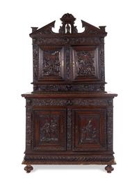 A Henry IV Carved Walnut Cupboard