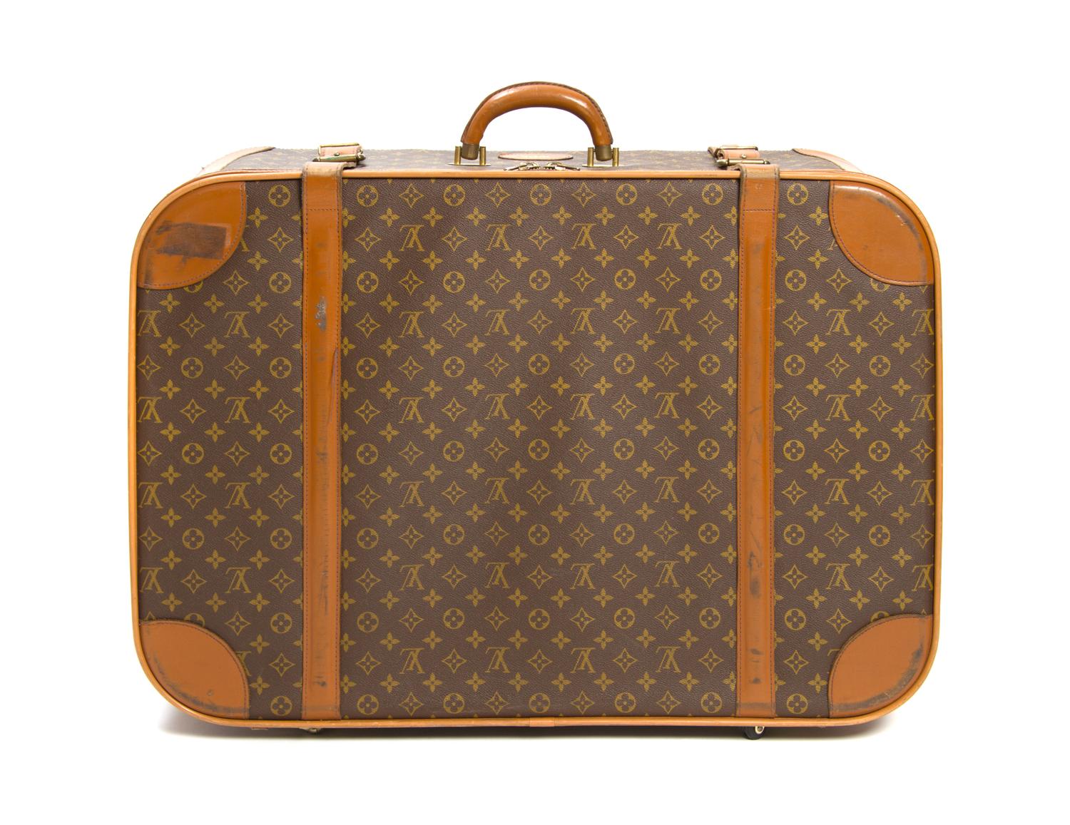A Louis Vuitton Monogram Canvas Soft-sided Suitcase, 29 x 20 1/2 x 9 inches.