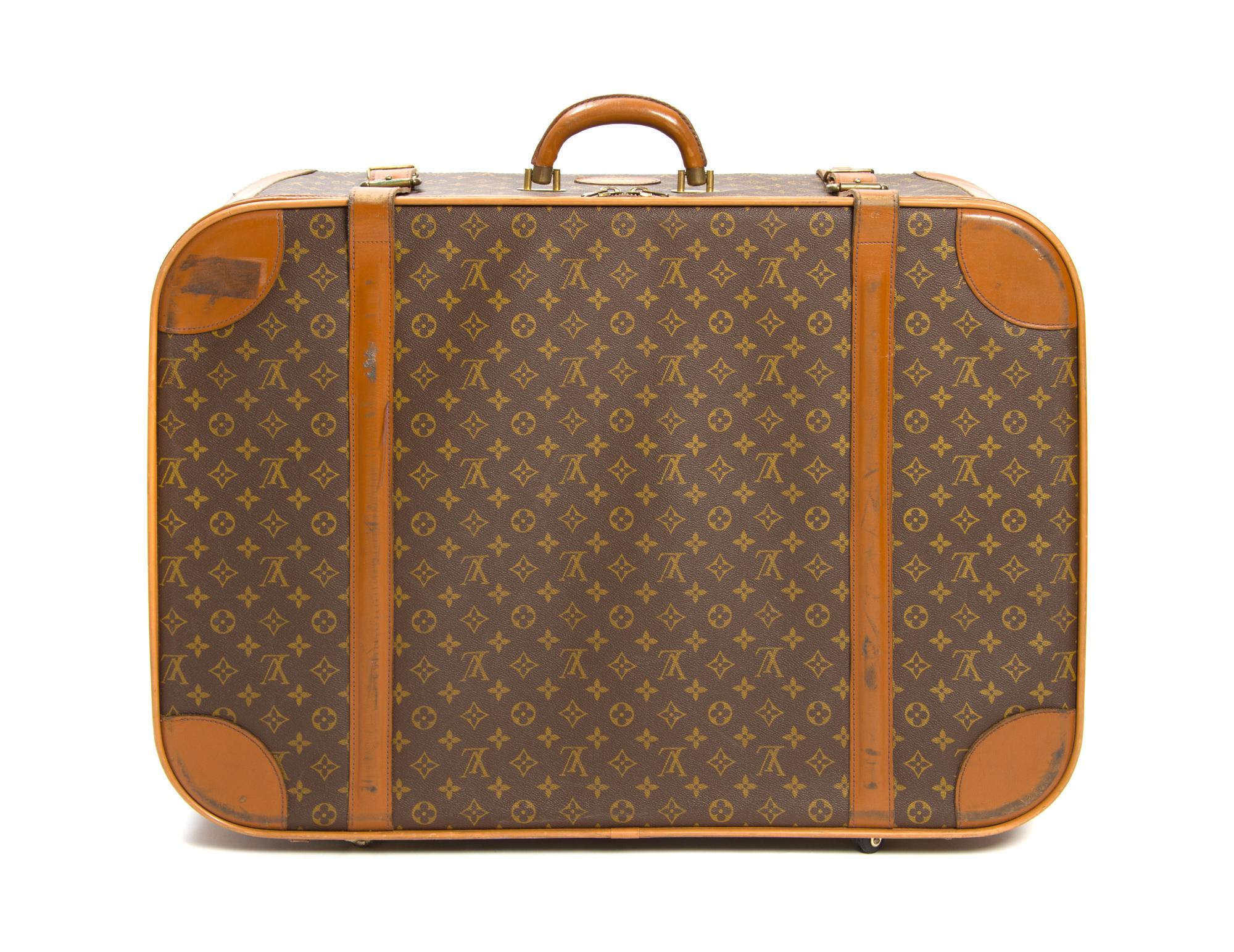 A Louis Vuitton Monogram Canvas Soft-sided Suitcase, 29 x 20 1/2 x 9 inches.