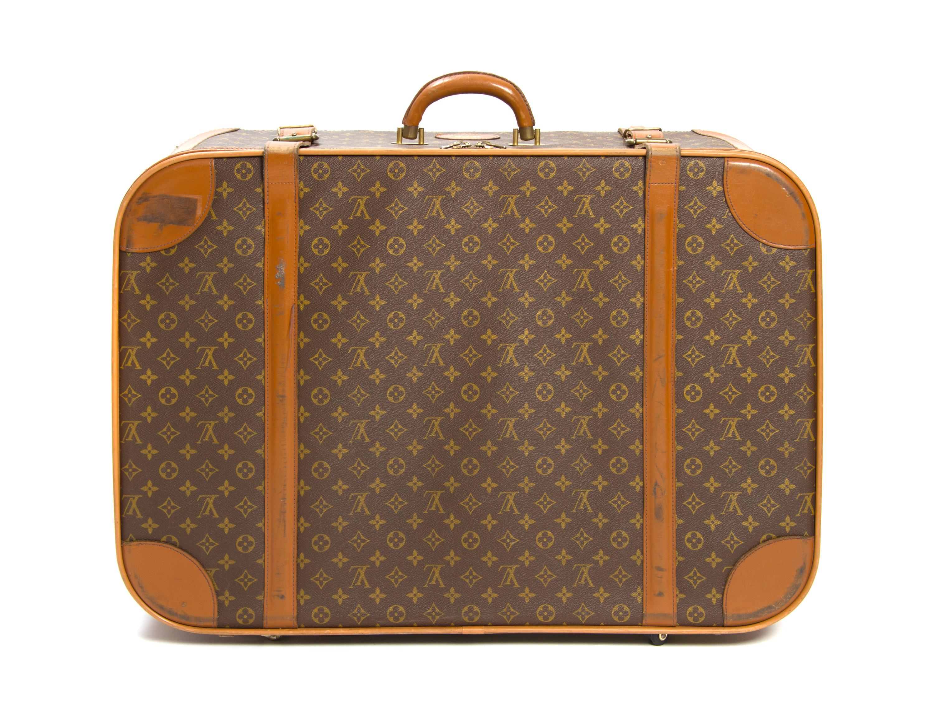 A Louis Vuitton Monogram Canvas Soft-sided Suitcase, 29 x 20 1/2 x 9 inches.