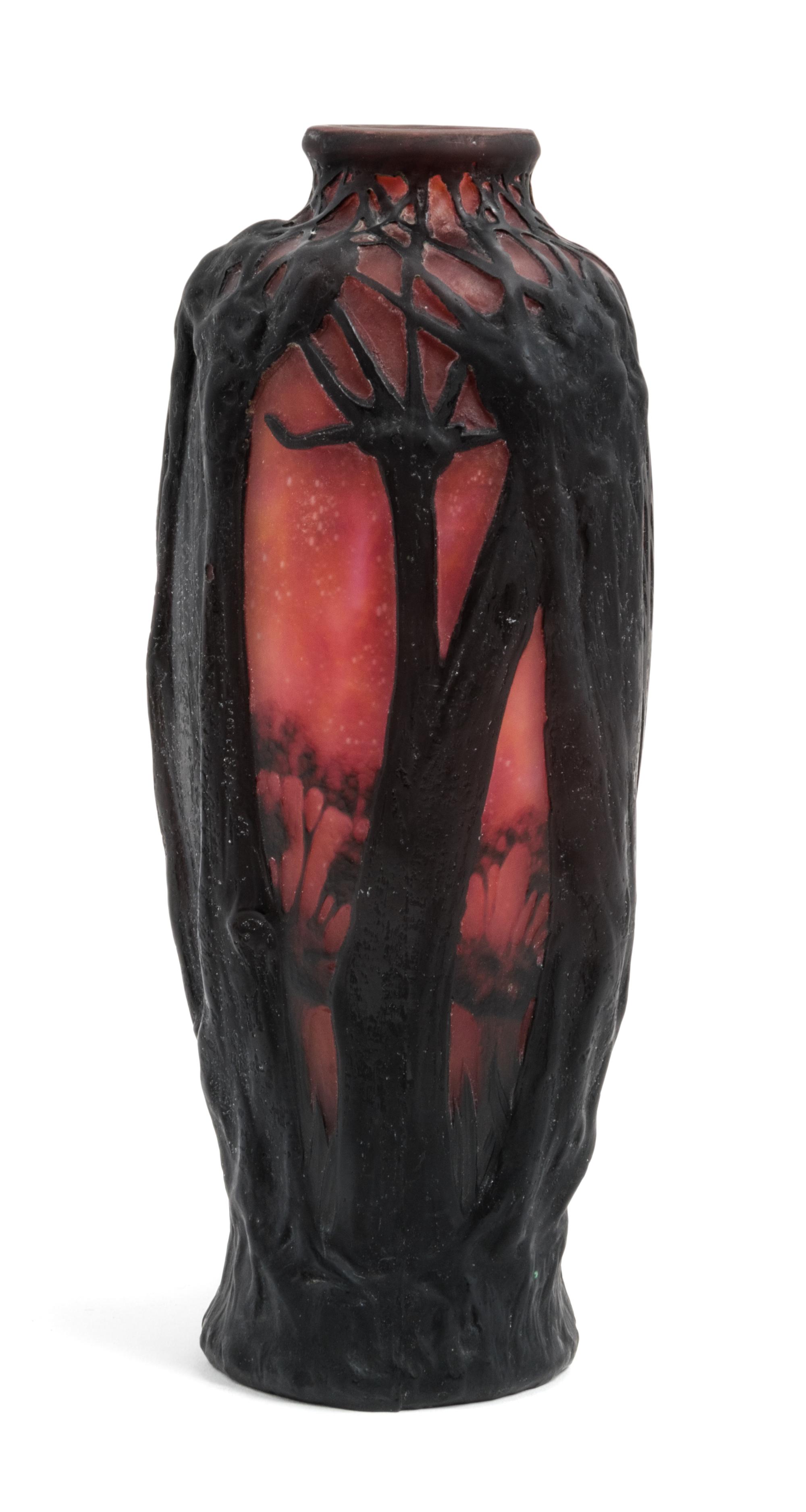 Daum, EARLY 20TH CENTURY, a mold blown cameo glass vase, with forest decoration