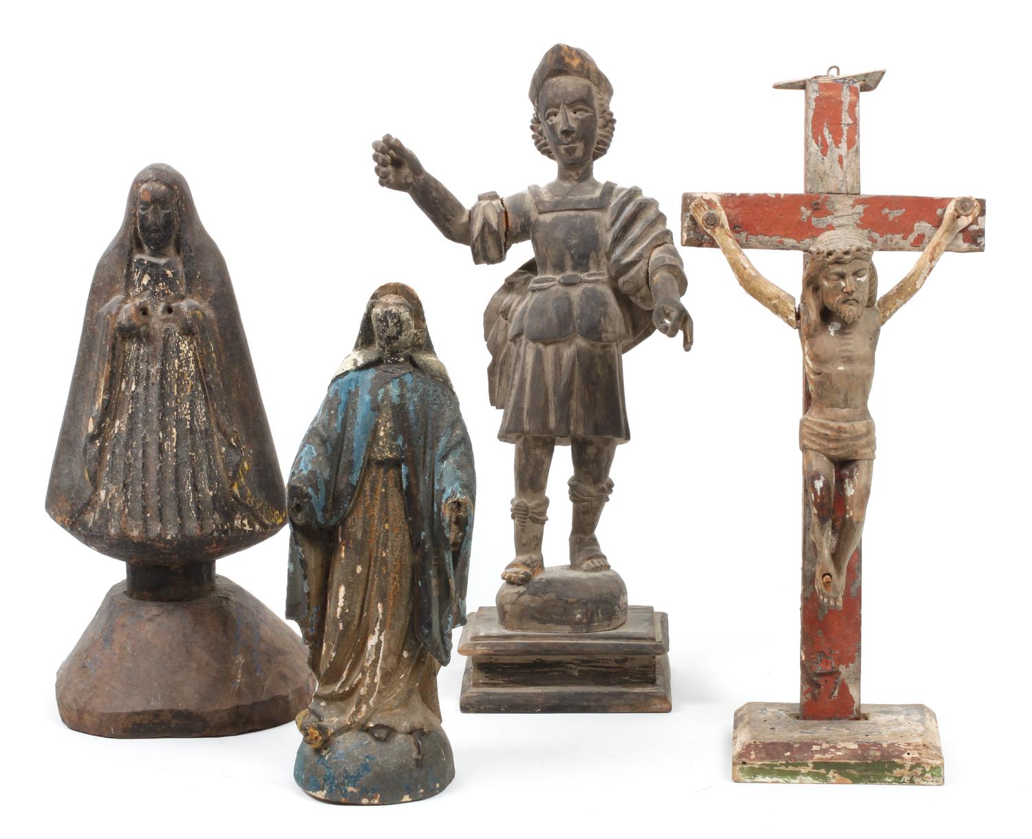 Four Southwestern Carved Wood Bultos Height of tallest 16 3/4 inches.