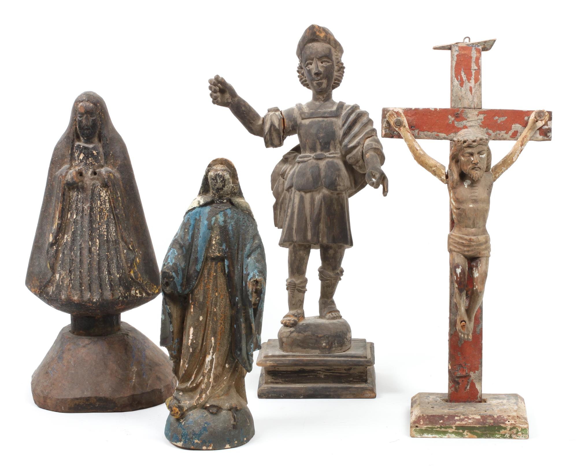 Four Southwestern Carved Wood Bultos Height of tallest 16 3/4 inches.