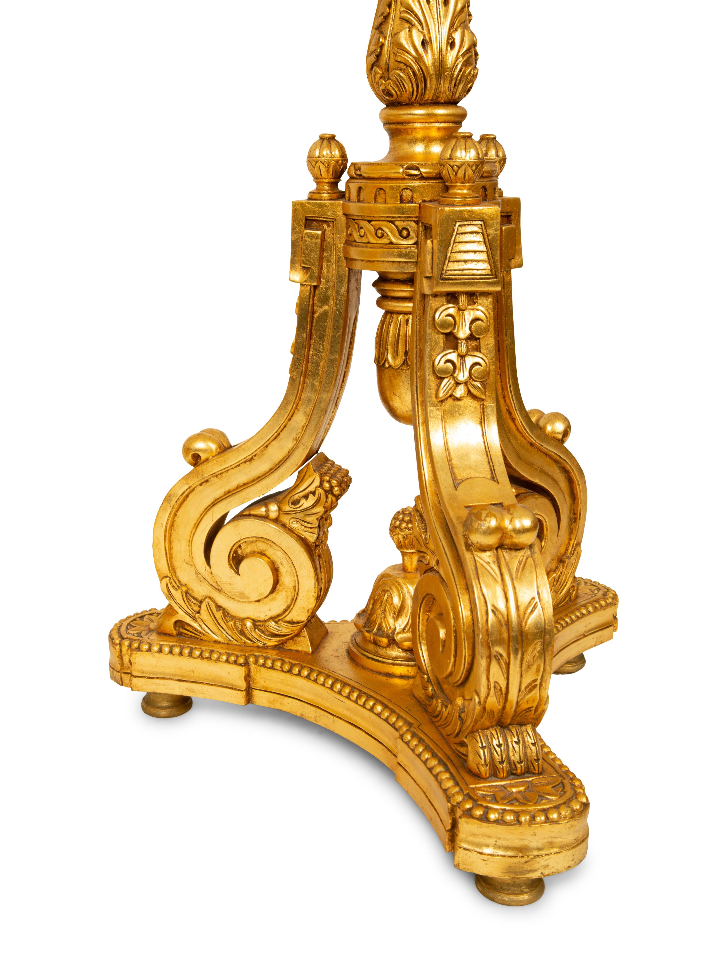 A Pair of Louis XVI Style Giltwood Torcheres — 20TH CENTURY