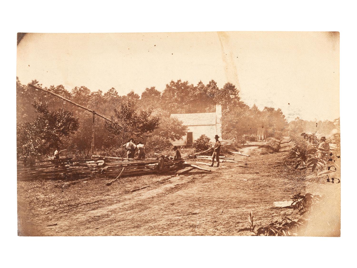 [CIVIL WAR]. A group of 2 albumen photographs of Cold Harbor, Virginia, incl. post-battle scene and Charles A. Dana, Assistant Secretary of War, at camp. [June 1864].