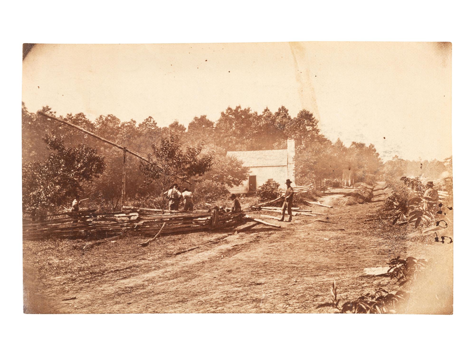 [CIVIL WAR]. A group of 2 albumen photographs of Cold Harbor, Virginia, incl. post-battle scene and Charles A. Dana, Assistant Secretary of War, at camp. [June 1864].