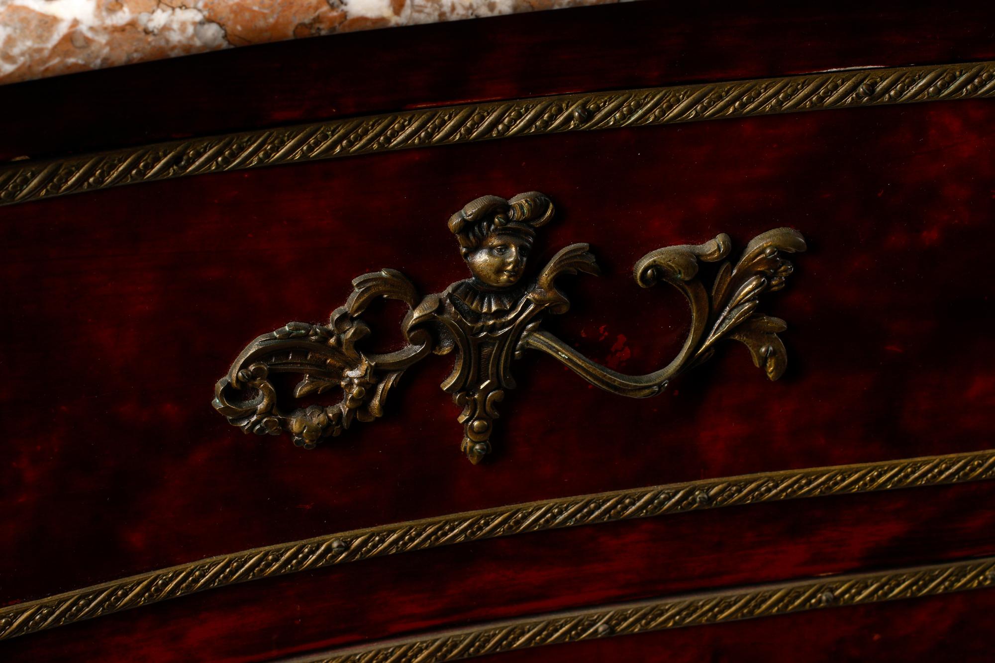 A Louis XV Style Faux Shell-Painted and Gilt Bronze Mounted Commode