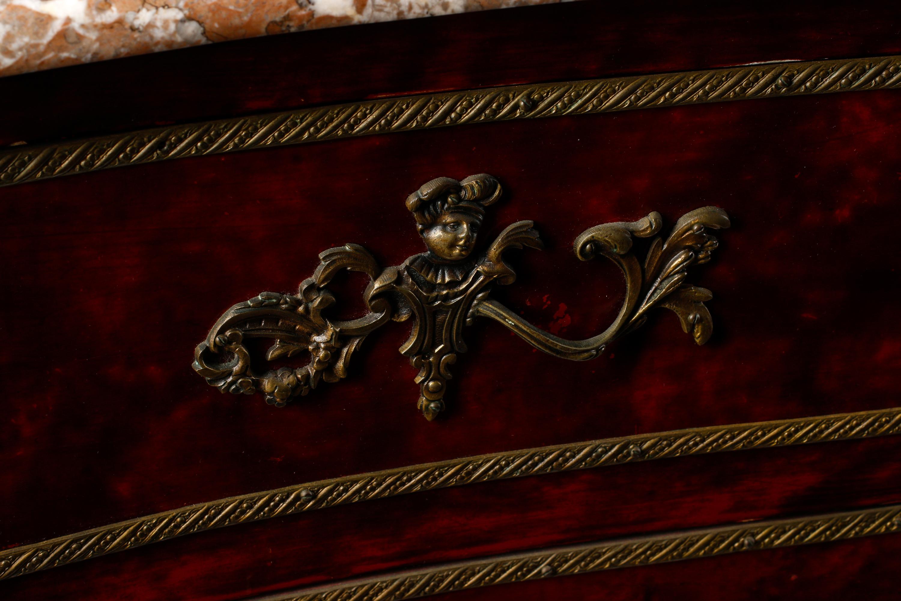 A Louis XV Style Faux Shell-Painted and Gilt Bronze Mounted Commode