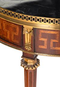 A Louis XVI Style Gilt Metal Mounted Marble-Top Mahogany Guéridon
