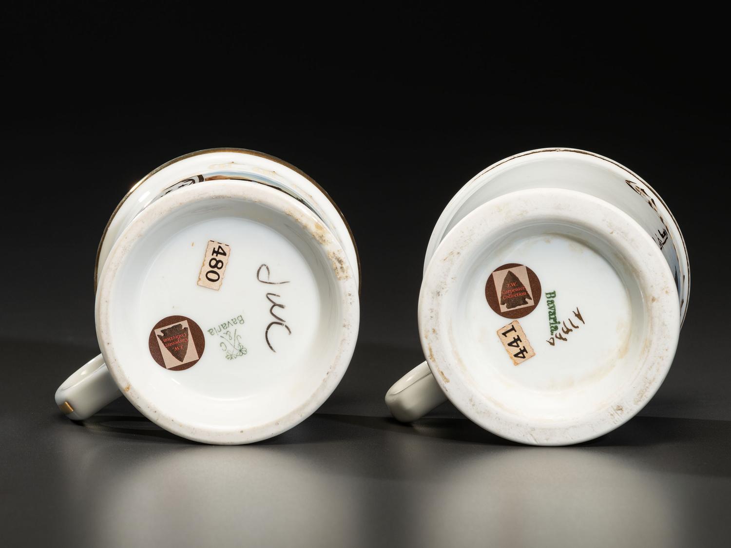 Two Porcelain Shaving Mugs Depicting Automobiles with Drivers