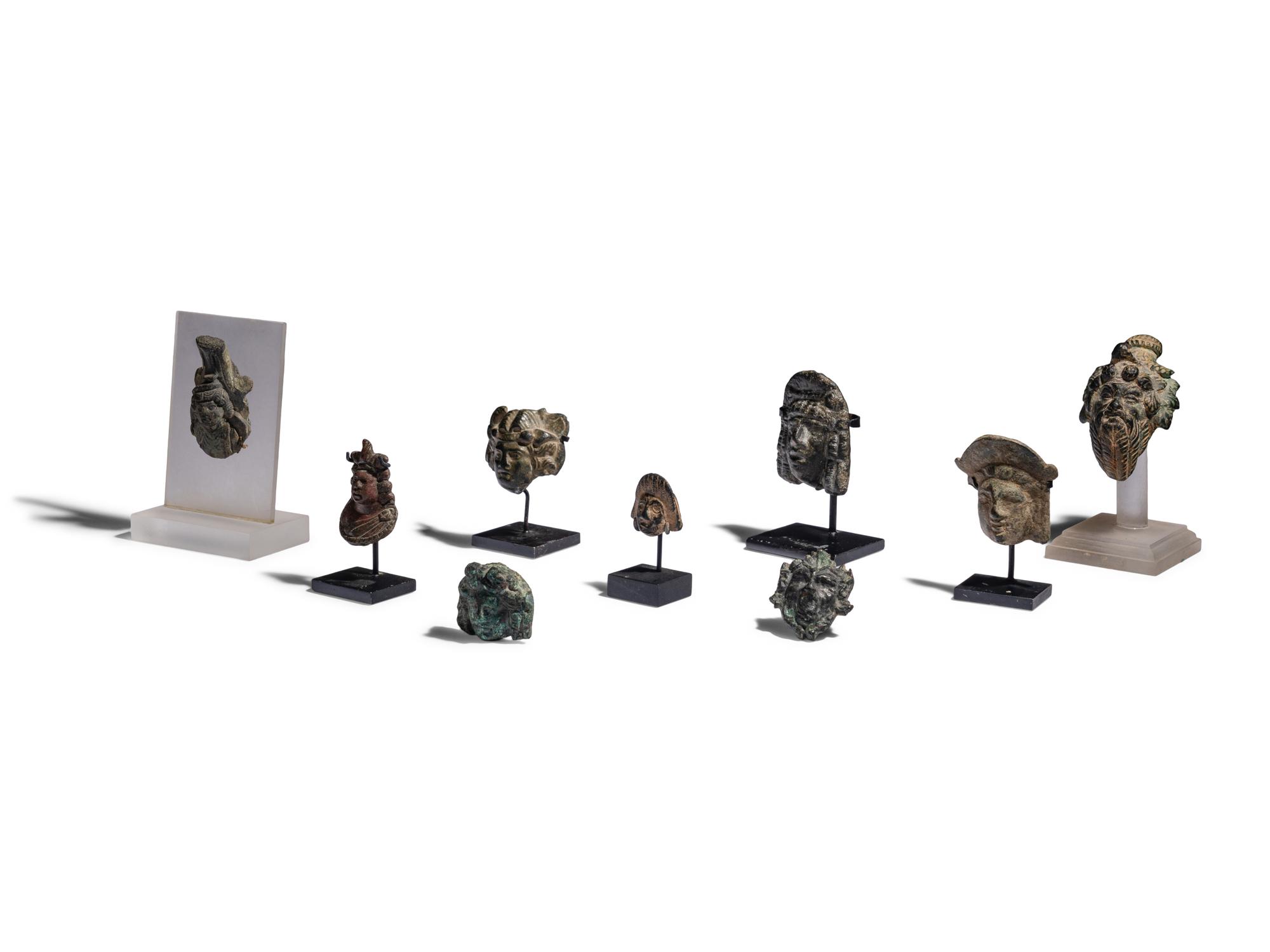 Nine Roman Bronze Masks