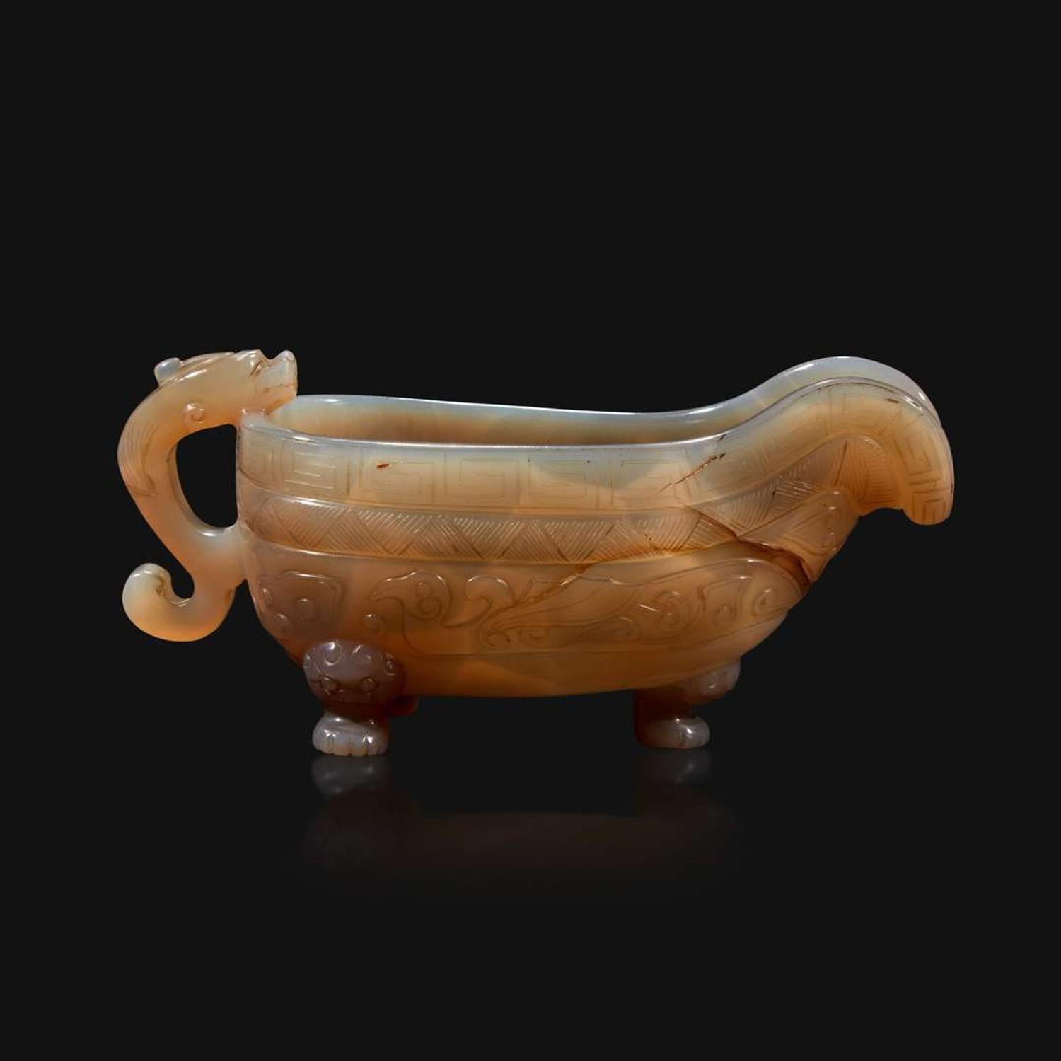 A Chinese archaistic carved agate libation cup, Yi Qing dynasty, 18th/19th century