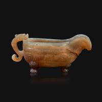 A Chinese archaistic carved agate libation cup, Yi Qing dynasty, 18th/19th century
