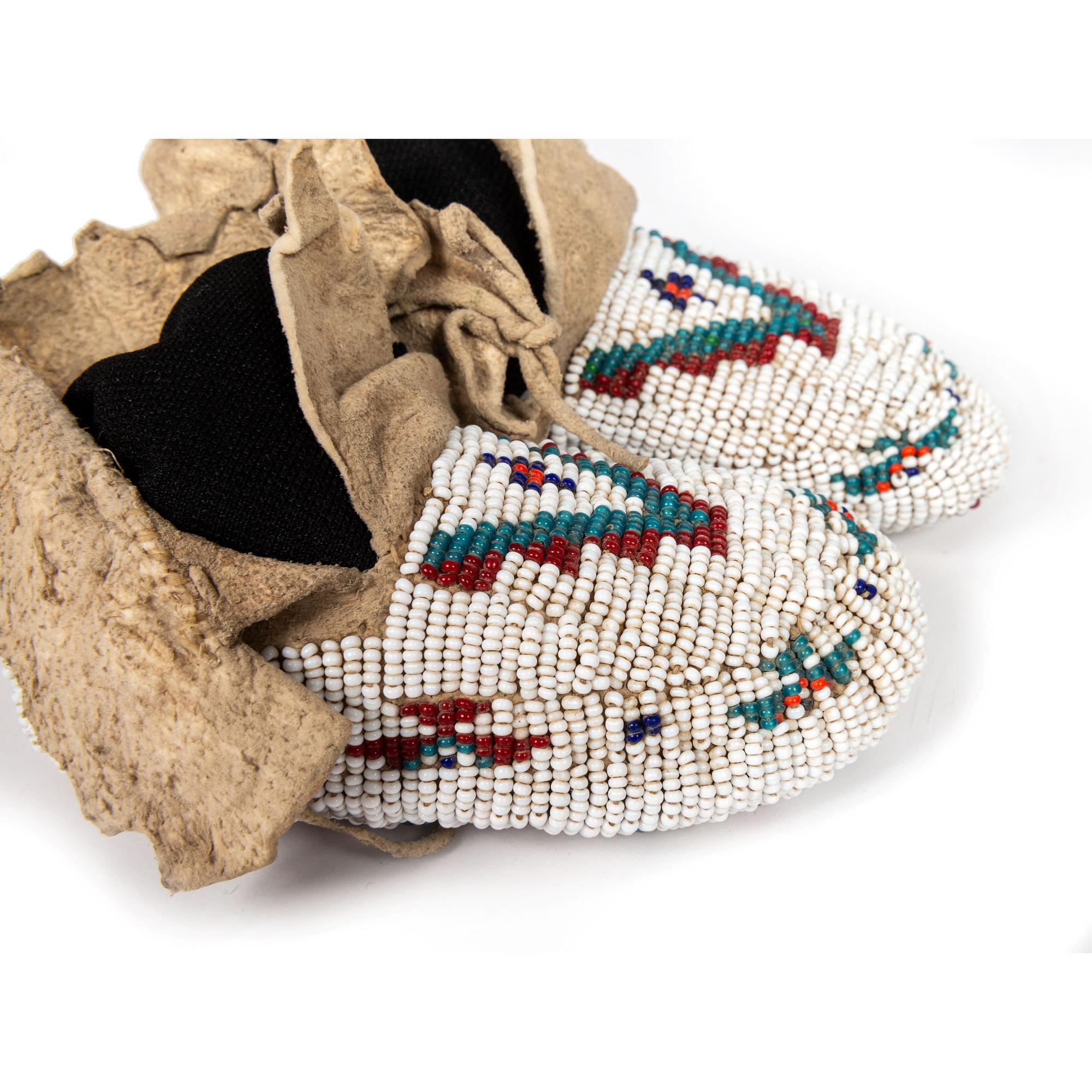 Northern Plains Child's Beaded Hide Moccasins and Miniature Painted Parfleche Envelope