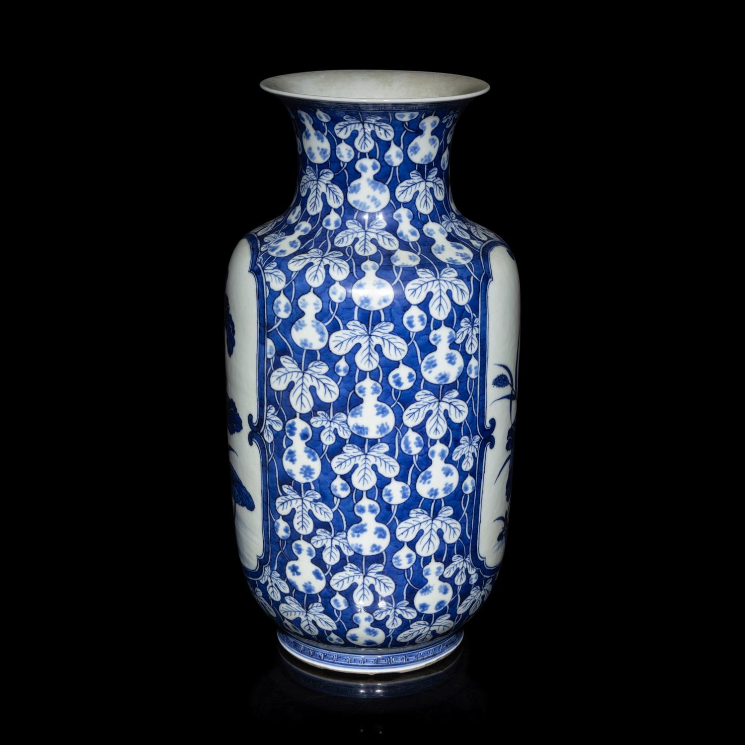 A Chinese Blue and White 'Gourds and Lotus' Vase, Qing Dynasty 清晚期 青花葫蘆紋地開光荷塘圖燈籠瓶