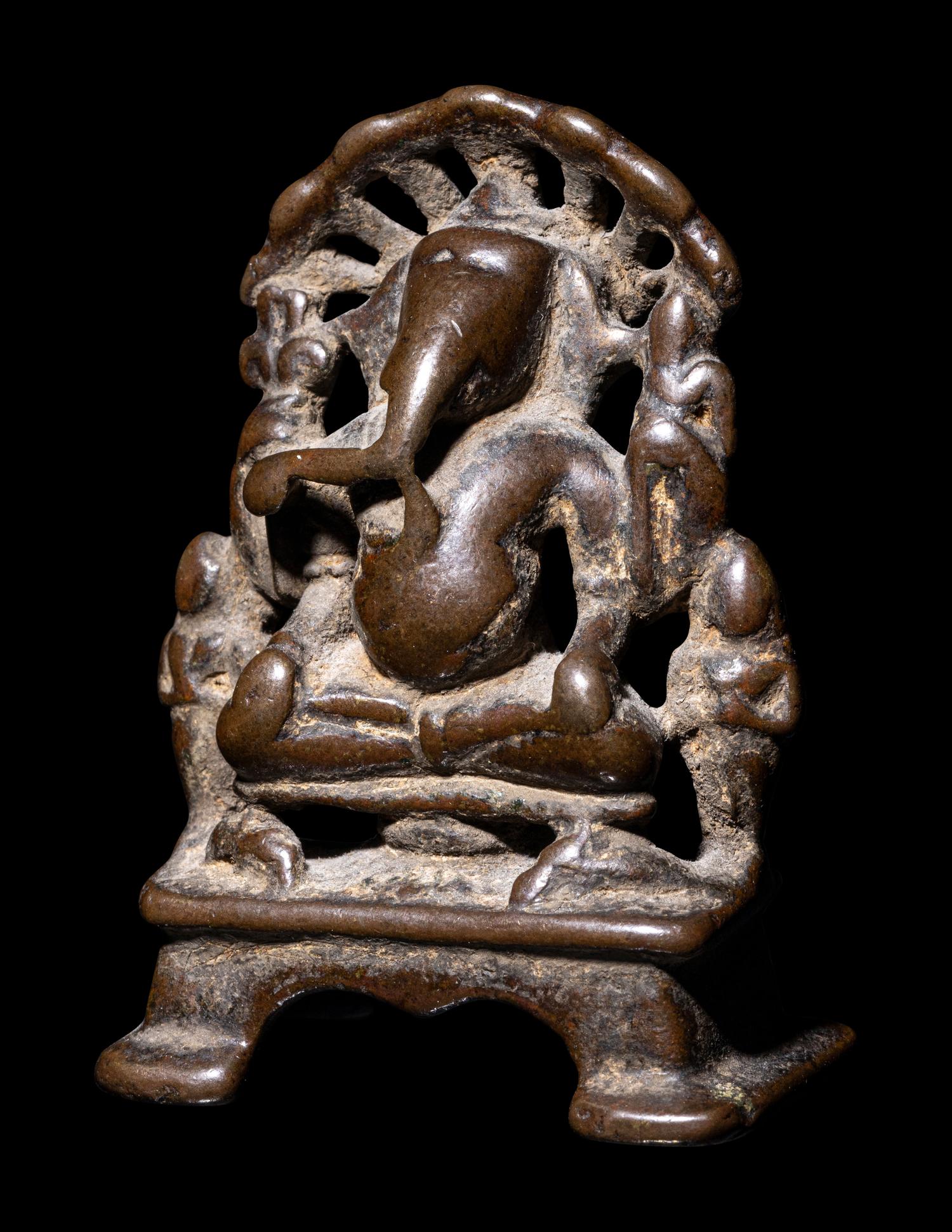 A Small Indian Bronze Figure of Ganesha