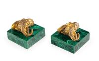 A Pair of Gilt Bronze and Malachite Ram's Head Table Ornaments