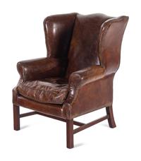 A Pair of Georgian Style Leather Upholstered Wingback Armchairs