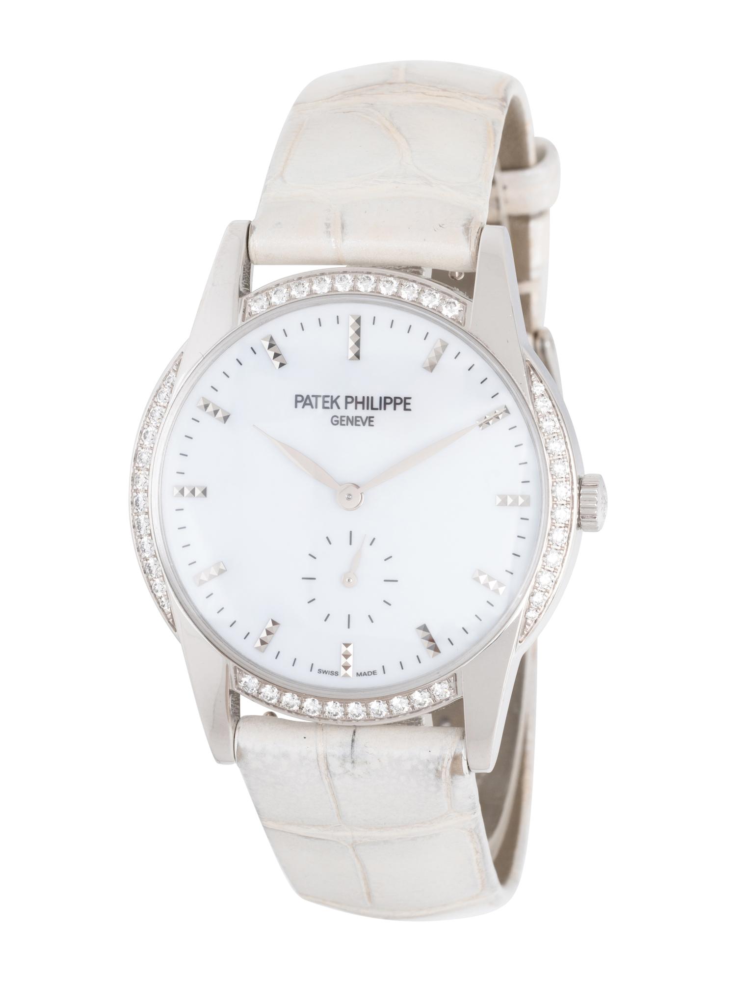 PATEK PHILIPPE, REF. 7122/200G-011 18K WHITE GOLD AND DIAMOND 'TIMELESS WHITE' 'CALATRAVA' WATCH, WITH CERTIFICATE OF ORIGIN