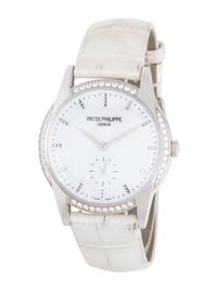PATEK PHILIPPE, REF. 7122/200G-011 18K WHITE GOLD AND DIAMOND 'TIMELESS WHITE' 'CALATRAVA' WATCH, WITH CERTIFICATE OF ORIGIN