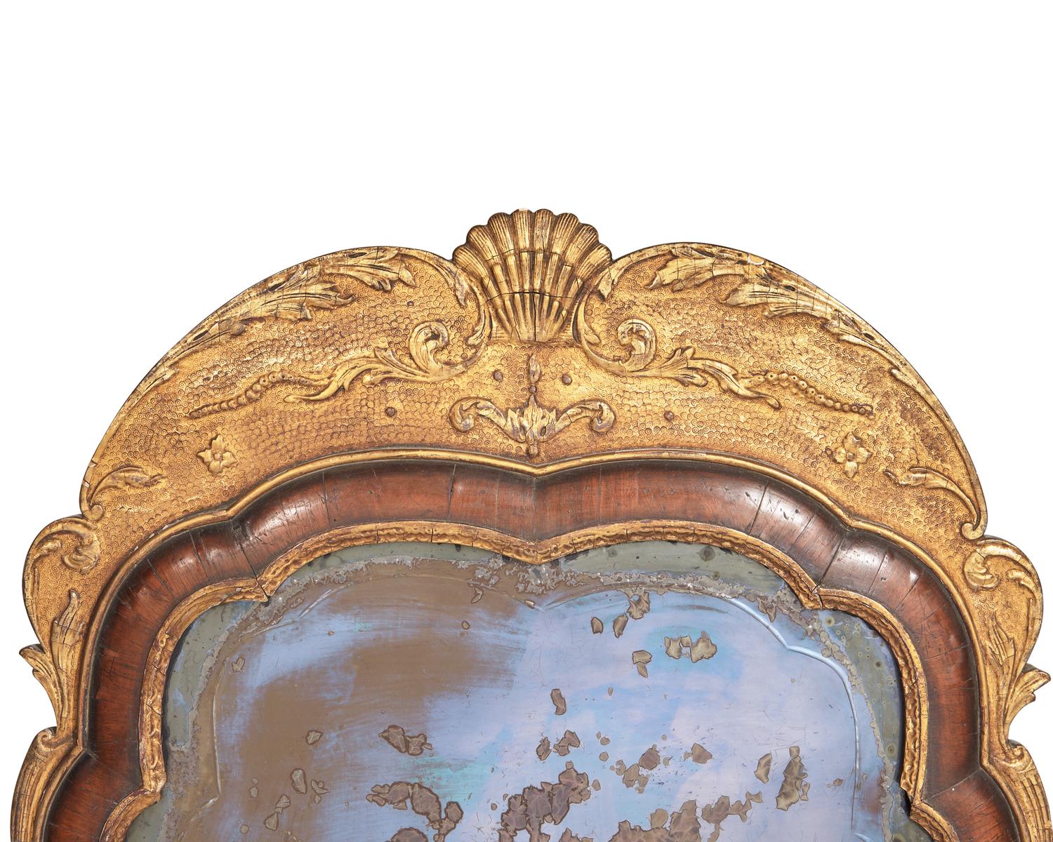 A pair of Queen Anne giltwood and walnut veneered pier glasses with etched mirror plates, 18th / 19th century