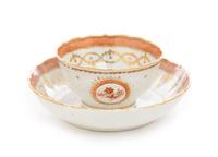 A Chinese Export Polychrome Enameled Porcelain Cup and Saucer Diameter of saucer 5 3/8 inches. — 19TH CENTURY