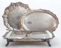 A Collection of Silver-Plate Serving Articles Height of first 8 3/4 inches.