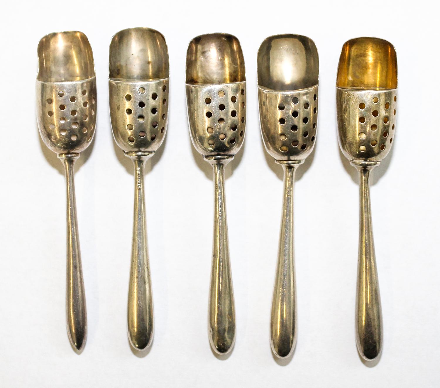 A Collection of American Silver and Silver-Plate Salt Sifter Spoons, various makers, each having a shovel bowl with a perforated panel
