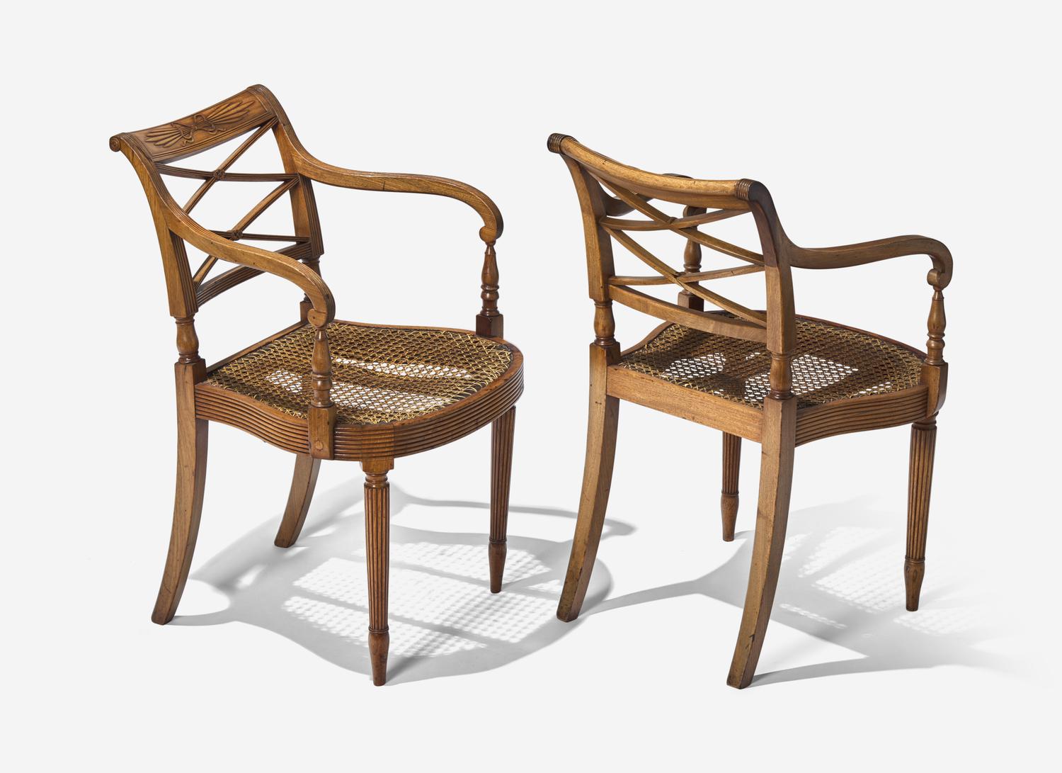 A Pair and Two Similar Federal Carved Mahogany Armchairs