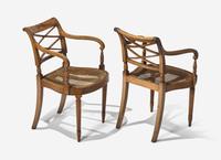 A Pair and Two Similar Federal Carved Mahogany Armchairs